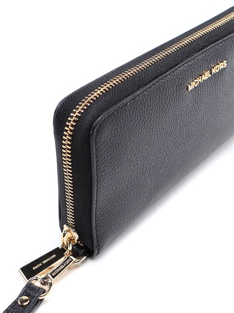 michael michael kors signature jet set item travel continental wallet|Michael Kors silver metallic wallet.